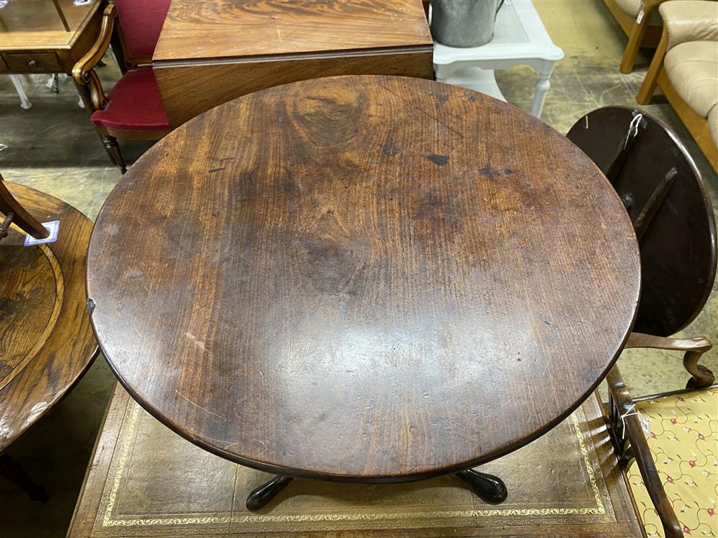 A George III mahogany circular tilt top birdcage tea table, 75cm diameter, height 70cm